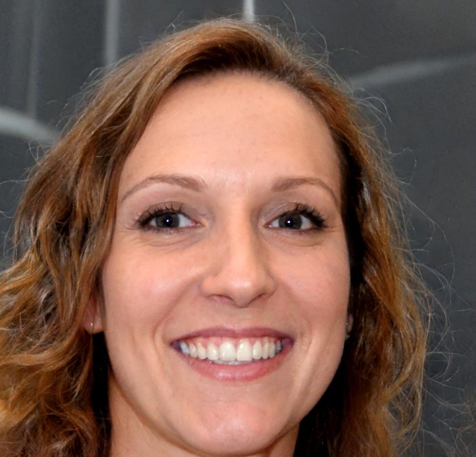 Portrait of Iris Vidal, Lead Instructor for Family Financial Planning